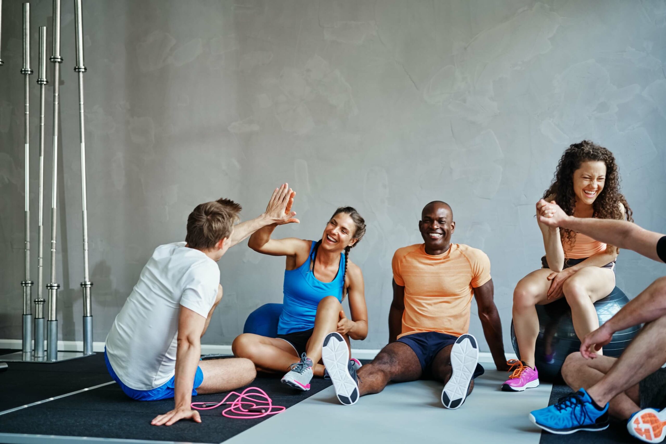 Gym group high-fiving